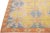 Beautiful Modern hand-knotted wool rug with a beige color field. This piece has a gorgeous blue, yellow, and orange...