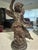 Metal Antique Bronze Cherub Holding a Torch Candle Holder 14in For Sale - Image 7 of 9