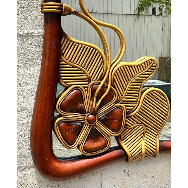 Add a coastal touch to your décor with this Vintage Coastal Pencil Reed Flower Mirror. Crafted with delicate pencil reed...