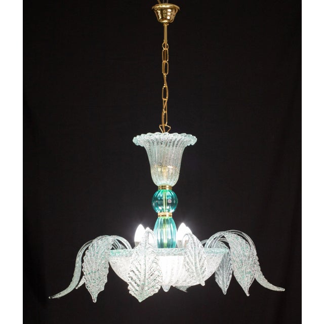 Venetian murano chandelier full of leaves. There are 12 leaves and they are of three different alternating types, a...