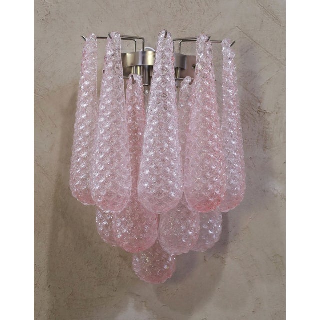 Pair of Murano Wall Sconce consisting of two pink wall lamps with ten glass drops fixed on a chrome frame. Traditional...