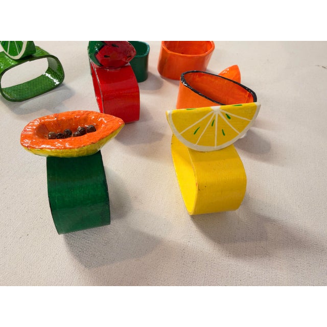 Vintage Hand painted Mixed Fruit Lacquered Papier Mâche Set of 7 Napkins Rings, They are in very good condition. 2.5" W X...