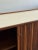W66.25 D20 H29 Vintage credenza restored both structurally and aesthetically. Unit features sculptural legs, reeded...
