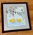 Charming folk art framed watercolor painting of a duckling pair below some flowering branches. Please see condition...