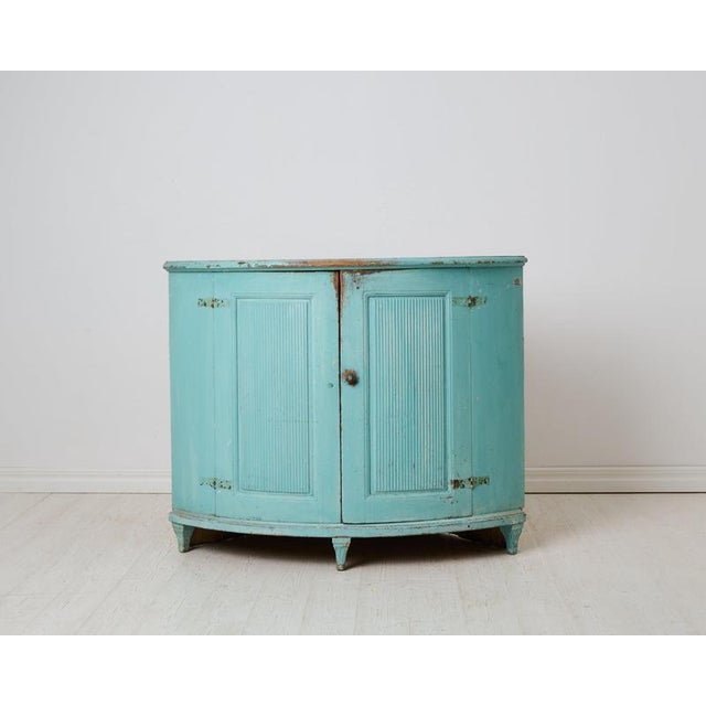 Antique gustavian corner sideboard from the late 18th century. Made by hand in Northern Sweden around 1790 with a frame in...