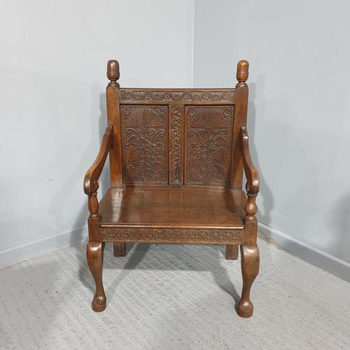 This is an excellent quality carved oak hall settle of small proportions, well carved and in excellent condition....