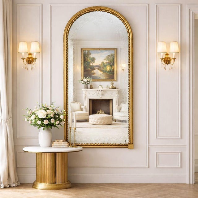 LOUIS PHILIPPE ARCHED TOP GILTWOOD PIER MIRROR France, circa 1870s 73" H x 2" D x 32 1/4" W ref. 601EIK14Z A tall Louis...