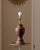 A signed and dated studio pottery table lamp by Petzold, created in 1973. Hand-thrown ceramic construction with a richly...