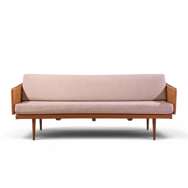 Peter Hvidt and Orla Mølgaard Nielsen Mid Century Teak and Cane Daybed This daybed measures: 79.75 wide x 30.5 wide x 30...