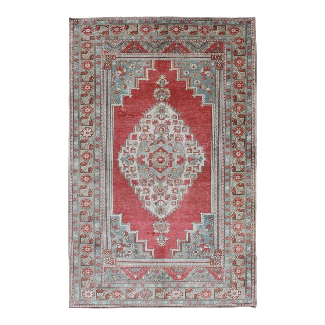 Mid 20th Century Vintage Turkish Oushak Rug With Medallion Design in Coral Pink and Light Blue For Sale