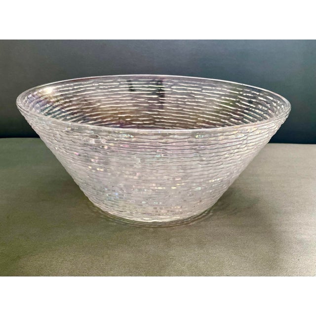 A beautiful textured glass serving bowl in the “Serrano” pattern.