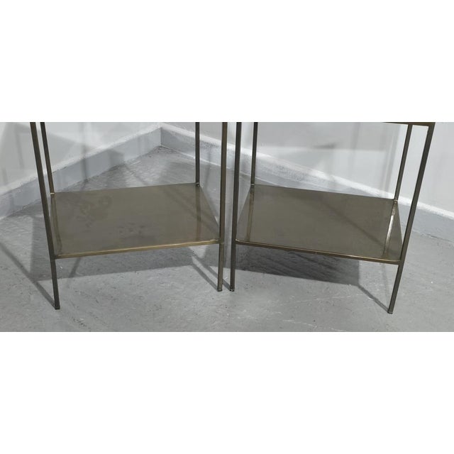 A very nice pair of French metal lamp tables with bronzed top and base, in very good overall condition. 22" high 18" wide...