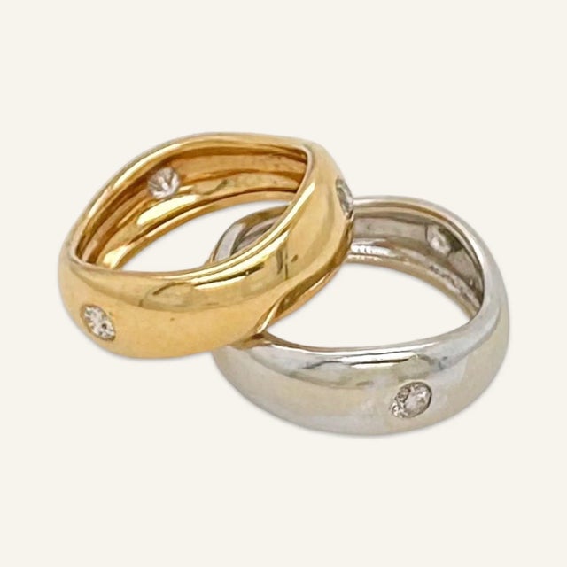 This is part of Chairish’s Fine Jewelry assortment. Set of famous Cartier “Love Me” bands. These 18k yellow and white gold...