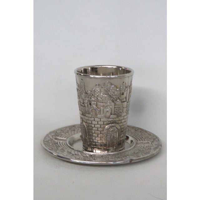 This beautiful Boxed Cup and Saucer Set is made of non-tarnish metal. This set is stamped on the bottom as being made by...