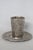 This beautiful Boxed Cup and Saucer Set is made of non-tarnish metal. This set is stamped on the bottom as being made by...