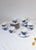 This 11-piece coffee set from the Danish firm Royal Copenhagen, part of their "Blå Blomst" (Blue Blossom) collection, is a...