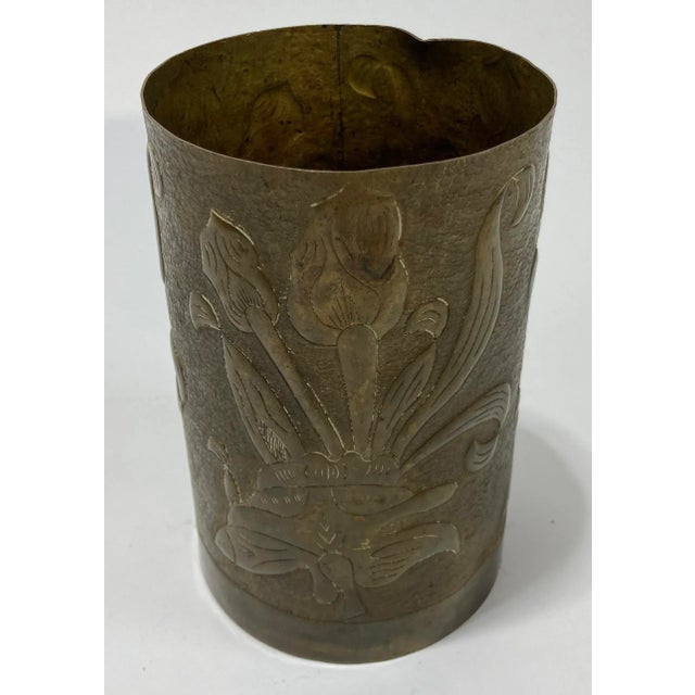 Vintage brass trench art vase vessel featuring hand-carved floral design on large artillery shell. Likely of French origin...