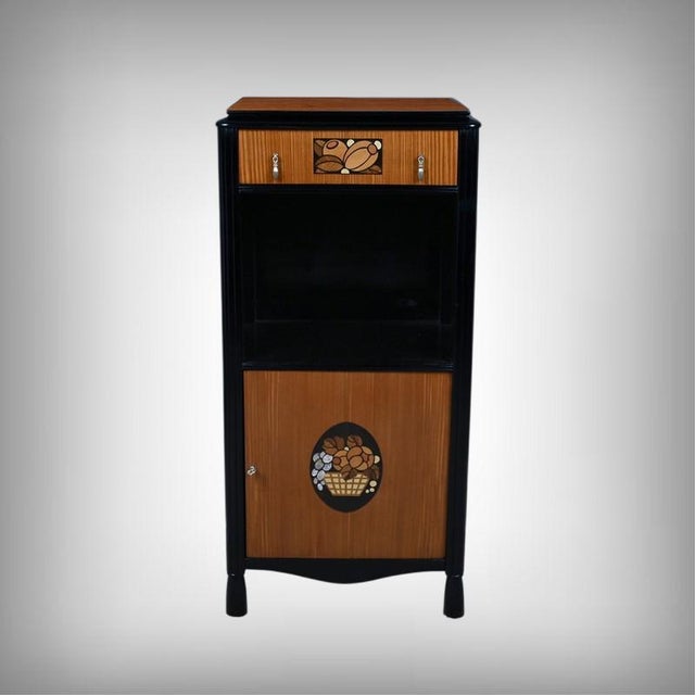 This console table embodies the decorative spirit of the 1940s, in the style of designers Louis Sue and André Mare,...