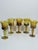 A luminous set of art glass goblets. The wide flair rims, thick sculptural stems and rounded bases give these pieces a...