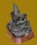 A beautifully done sculpture of a pair of wolves sitting on a wooden plinth Name tag is D. Kennicutt. I have not been able...