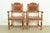An exceptional pair of antique English Jacobean style armchairs or dining captain chairs By Batesville Cabinet Co. (early...