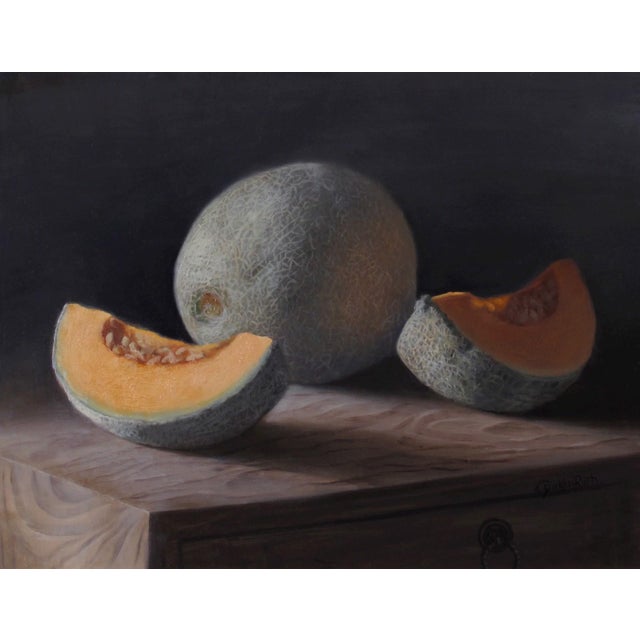 This oil painting depicts a still life featuring melons, with a whole melon and two cut halves arranged on a wooden...
