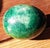 An exquisite mid-century decorative marble egg that stands out with its stunning emerald green hue! This life-sized...