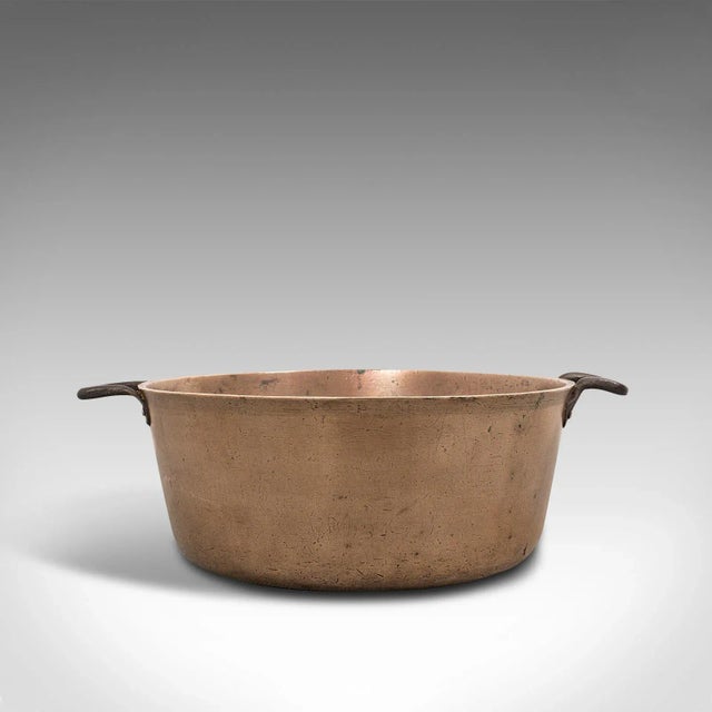 This is a superb antique jam pan. An English, heavy bronze preserves or cooking pot with iron handles, dating to the late...