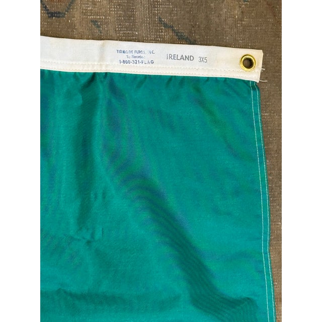 This is a Late 20th century vintage Irish flag. It has green, white, and orange stripes. The green represents the Irish...