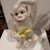 This vintage Italian glazed ceramic monkey figurine brings exactly the kind of playful sophistication collected rooms...