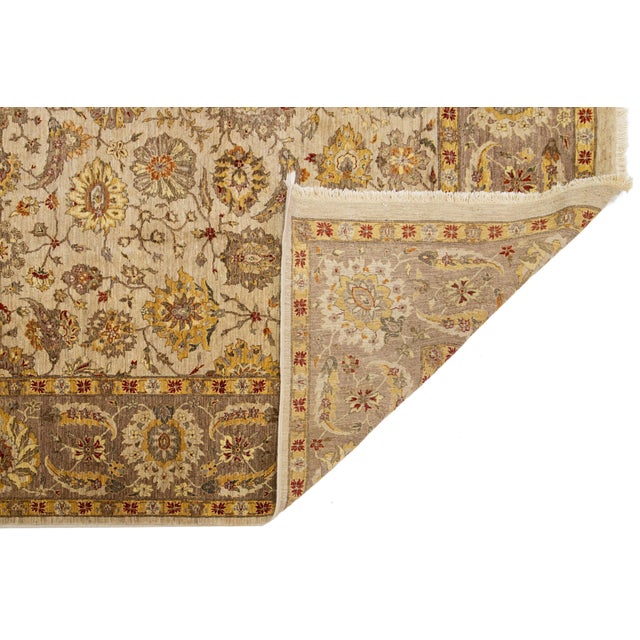 Modern Pakistani Peshawar Rug – Hand-knotted in fine wool, this elegant piece features a cream field with intricate floral...