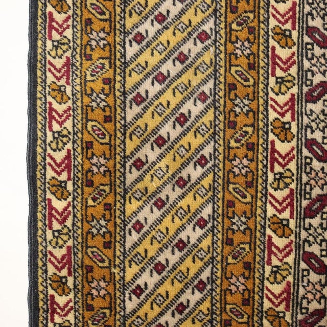 Shirvan rug in cotton and wool; fine knot. Manual manufacture. This piece is attributed to the mentioned designer/maker....