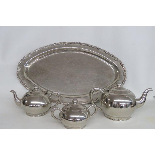 This gorgeous Tea/Coffee Serving Set is silver plated. This stunning set includes 4 total pieces; one sugar bowl, one...