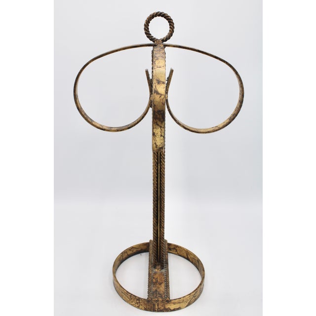 A stunning mid 20th century Italian gold gilded metal 4 ring towel rack with ornate detail. Lovely natural patina.
