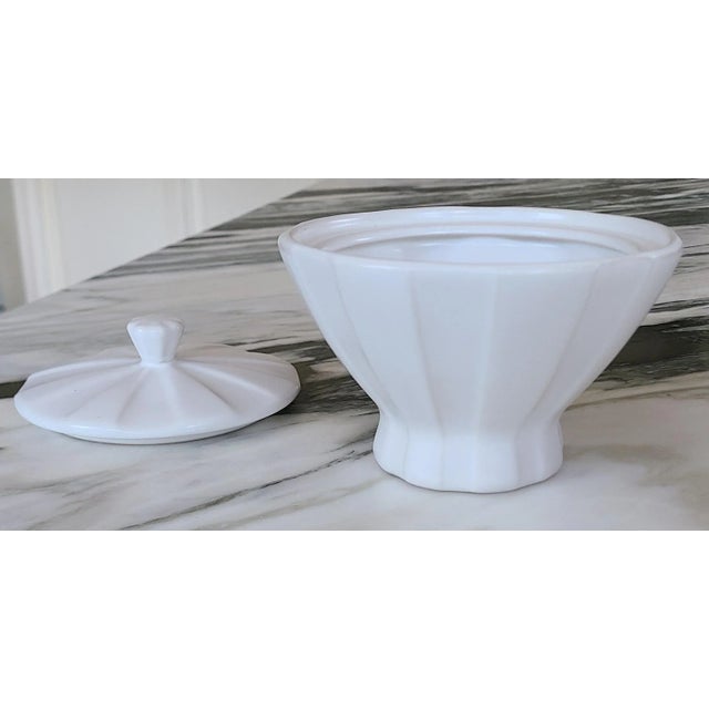 This is a vintage lidded container by Johathan Adler. Perfect as a room or shelf accent or for keeping small toiletries at...