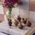 Beautiful collection of 6 vintage glazed miniature ceramics from France, 1950s. Varying shapes and sizes in a shiny brown...