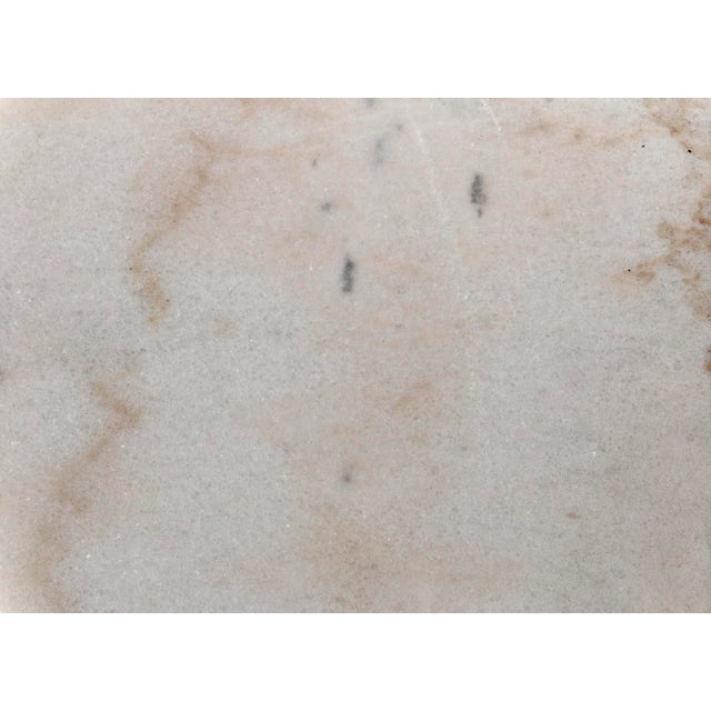 A dazzling display of design virtuosity, the artisan crafted Nox side table features marble finished in a white marble...