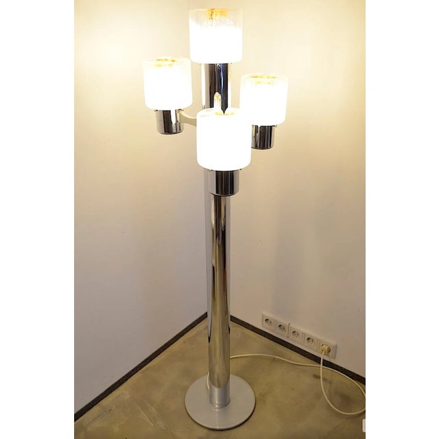 Floor lamp attributed to Mazzega from the 1960s. The floor lamp consists of 4 lamps, each equipped with an E14 lamp socket...