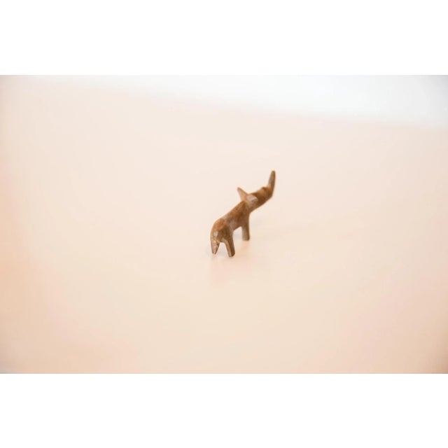 :: Vintage handmade copper casting of a miniature curved back rhinoceros. Circa mid 20th century and possibly older, this...