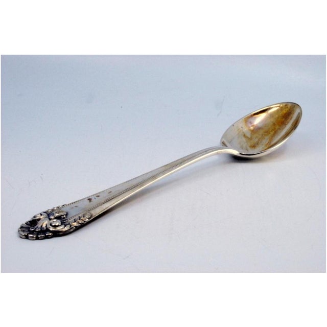 Silver Rice and Serving Spoon with Strips and Shell on the Handle, in Very Good conditions. Designed 1920 to 1949 This...