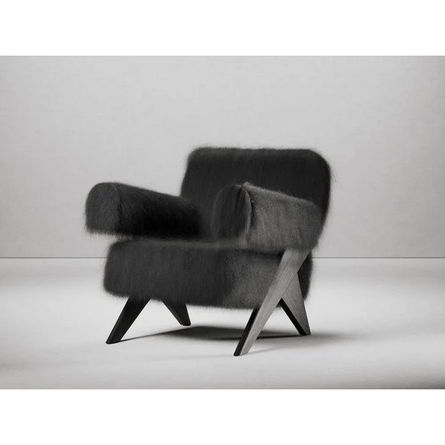 Mongolian fur souvenir armchair by gio pagani dimensions: d 77 x w 69 x h 75 cm. Sh: 38 cm. Materials: black elm wood and...