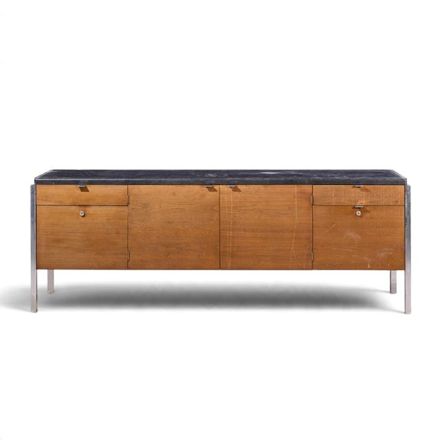 Stow & Davis Mid Century Walnut, Leather and Chrome Credenza This credenza measures: 73.75 wide x 20 deep x 26.25 inches...