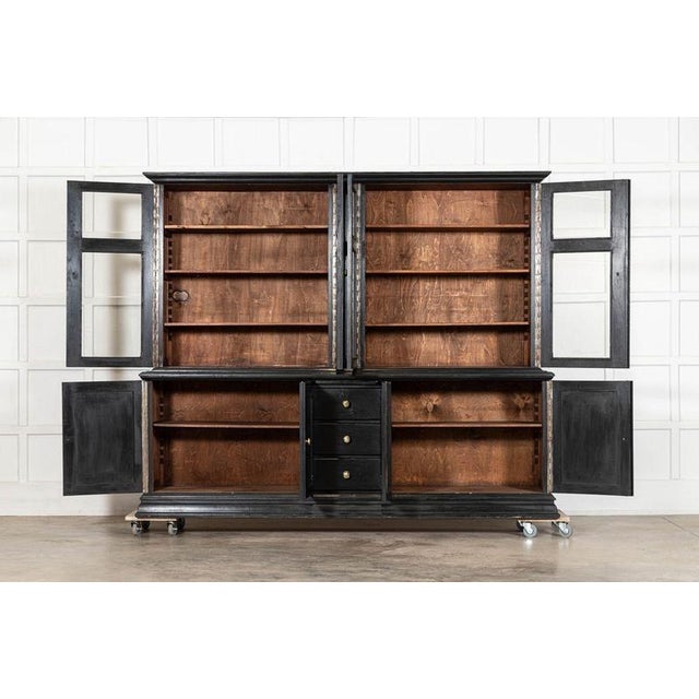 Circa 1880 monumental 19thc french ebonised fruitwood housekeepers cupboard together w234.5 x d52.5 x h193.5 cm base...