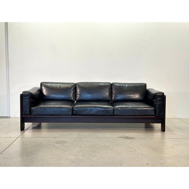 Bastiano three-seater sofa designed by Afra and Tobia Scarpa for Gavina in the 1960s, mahogany frame and leather-covered...