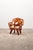 This is a beautiful wooden chair made by hand from presumably teak wood. It is recycled wood in the style of Andrianna...
