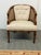 Design Plus Gallery presents a Vintage French Louis XVI Style Cane Barrel-Back Bergère Armchair. This distinctive armchair...