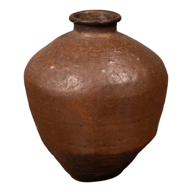 Antique Japanese Brown Oil Jar with Weathered Appearance and Irregular Shape For Sale