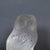 Chouette, an art deco glass paperweight. A frosted and clear glass paperweight in the form of a curious owl set over a...