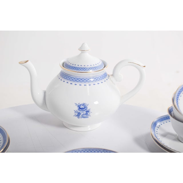 Incomplete tea set. Porcelain from the Vista Alegre Factory “Old Kitchen”, blue and white decoration. Faults, shortcomings...