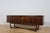 This unique sideboard was manufactured by Stonehill in the 1960s and is an excellent example of Mid-Century Modern design....
